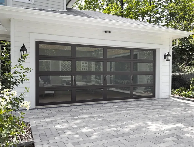 Davie Garage Door Repair design specialist presenting custom garage door options to Davie homeowner