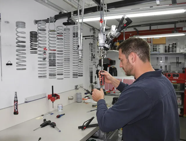 Davie Garage Door Repair safety certified technician performing precision spring replacement in Davie