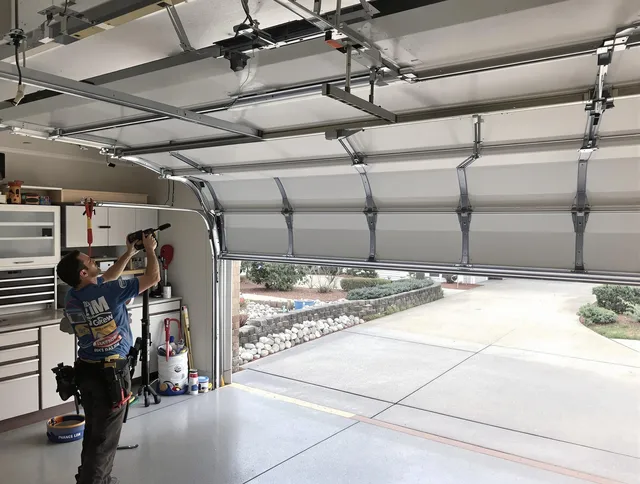 Garage door track repair service by Davie Garage Door Repair in Davie
